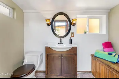 a bathroom with a sink and a mirror at Emeric Ave in Simi Valley in Simi Valley