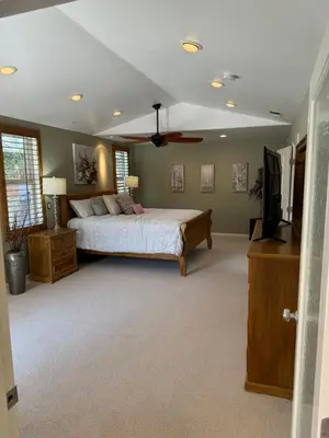 a bedroom with a bed and a flat screen tv at Emeric Ave in Simi Valley in Simi Valley