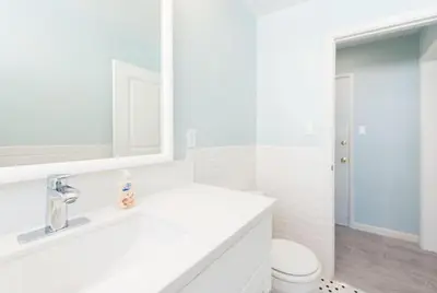 a white bathroom with a sink and a toilet at Sunny Studio in the Heart of Venice Beach - #6 in Los Angeles