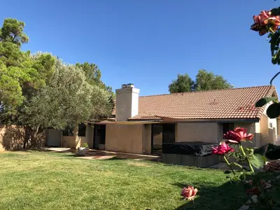 a house with a yard in front of it at Oasis Home near Rancho Vista in Quartz Hill