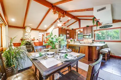 a kitchen and dining room with a table and chairs at Idyllic Home in Kernville with Private Beach Access in Kernville