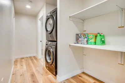 a laundry room with a washer and dryer at 10 Mi to Dtwn LA Cat-Friendly Rosemead Cottage in Rosemead