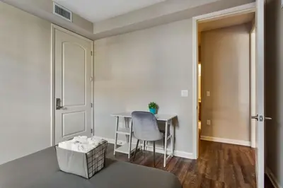 a room with a table and a chair and a door at Charming 1BD with Pool and Free Parking in Los Angeles
