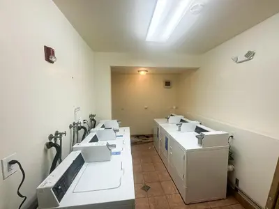 a room with a row of sinks in a room at Van Nuys Homes for the Soul in Los Angeles