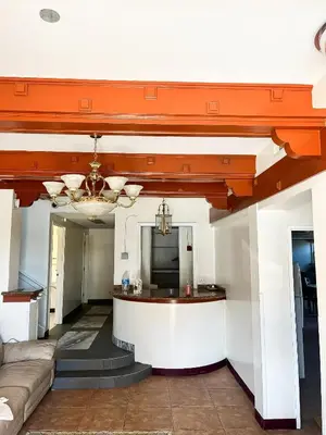 a living room with a bar and a couch at Van Nuys Homes for the Soul in Los Angeles
