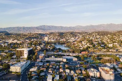 an aerial view of a city with a river and buildings at Fresh & New Downtown LA Condo! in Los Angeles