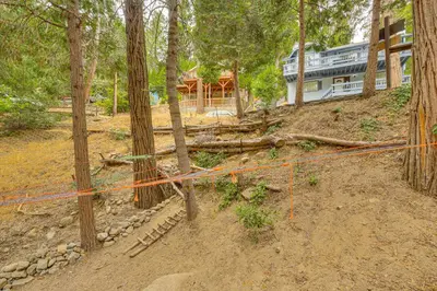 a house is being constructed in the woods at Cabin about 1 Mi to Lake Gregory and Hiking! in Crestline