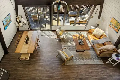 an overhead view of a living room with couches and tables at Larks Nest in Big Bear Lake in Big Bear Lake