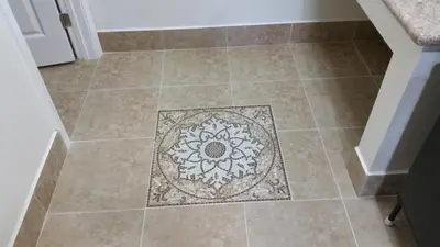 a tile floor with a mandala pattern on it at Kona Inn Motel Anaheim in Anaheim