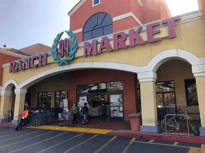 a market with people walking outside of a store at Sunrise Room 1 guest only near DTLA in San Gabriel