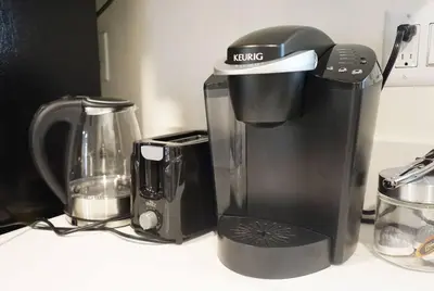 a coffee maker sitting on top of a counter at Spacious 3BR Modern Home in LA Perfect for Family in El Monte