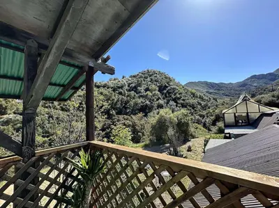 a wooden balcony with a view of a mountain at Topanga Panoramic View Loft with Trails & Creeks in Topanga