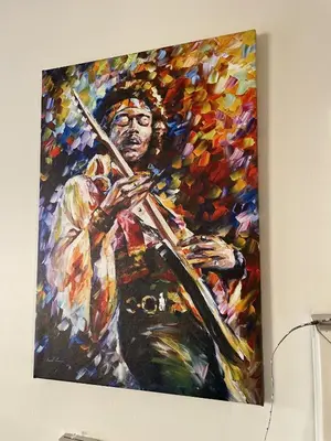 a painting of a man playing a violin at Cozy spot in Koreatown in Los Angeles