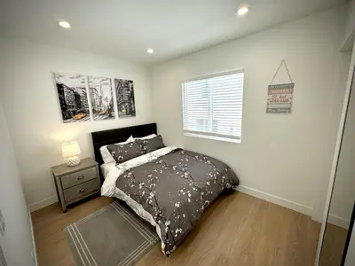 a bedroom with a bed and a window at RP415B - Inviting 1-Bedroom Haven in Captivating Burbank in Burbank