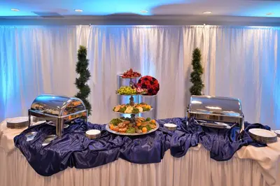 a table with a display of food on it at Holiday Inn Express Hotels & Suites Loma Linda by IHG in Loma Linda