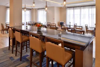 a large conference room with a long table and chairs at Holiday Inn Express Hotels & Suites Loma Linda by IHG in Loma Linda
