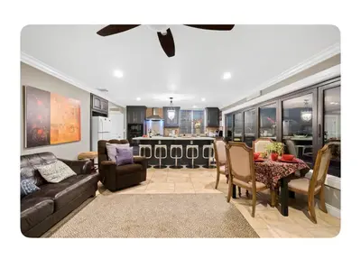 a living room with a couch and a table at LA Million dollar VIEW super spacious 5 bedroom home in Hacienda Heights