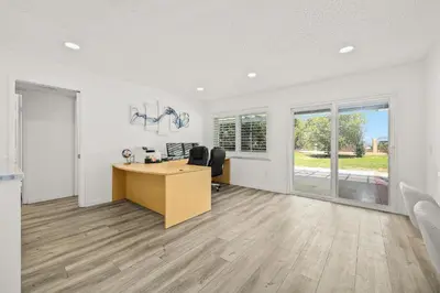 an office with a desk and chairs in a room at Newly Remodel Luxury Home with Hotel-Like Amenity in Rowland