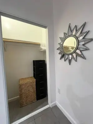 a mirror hanging on a wall in a room at Great Private Studio in Noho in Los Angeles