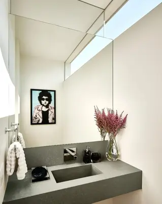 a bathroom with a sink and a mirror at Eterne by Stay Awhile Villas in Los Angeles