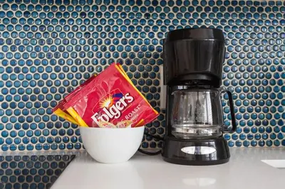 a coffee maker and a cup with a bag of chips at Sunny 1 Bedroom in the Heart of Venice Beach - #3 in Los Angeles