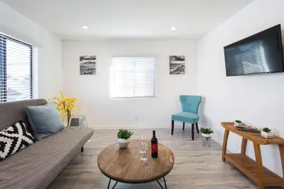 a living room with a couch and a table at Sunny 1 Bedroom in the Heart of Venice Beach - #3 in Los Angeles