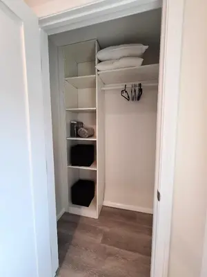 a walk in closet with a door open at Prime LA 2 bedroom & 3 bath home Beverly Hills adj in Los Angeles
