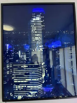 a view of a tall building in a city at night at Marilyn Studio Apartment in Koreatown in Los Angeles