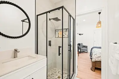 a bathroom with a shower and a sink at Cozy Retreat Near Downtown - Perfect for Families in Long Beach