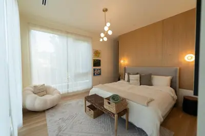 a bedroom with a large bed and a large window at Unique Home with Stunning Views in the Heart of Los Angeles, CA, Silverlake! in Los Angeles