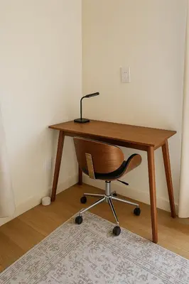 a wooden desk with a chair and a lamp on it at Unique Home with Stunning Views in the Heart of Los Angeles, CA, Silverlake! in Los Angeles