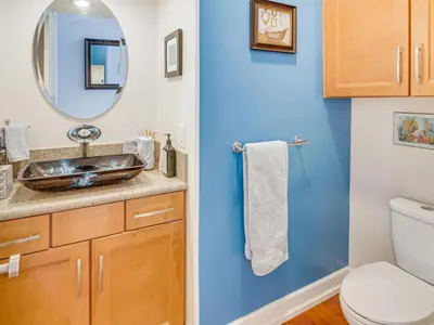 a bathroom with a sink and a mirror at 3BR Mountain Retreat with 2 Executive Suites & Scenic Views Sleeps 6 in Newbury Park