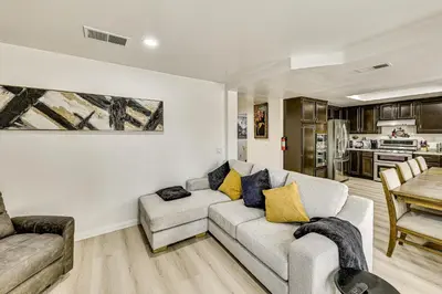 a living room with a couch and a table at 2 Mi to Victoria Gardens Rancho Cucamonga Haven in Rancho Cucamonga