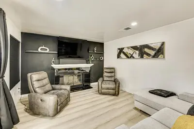 a living room with a couch and chairs and a piano at 2 Mi to Victoria Gardens Rancho Cucamonga Haven in Rancho Cucamonga