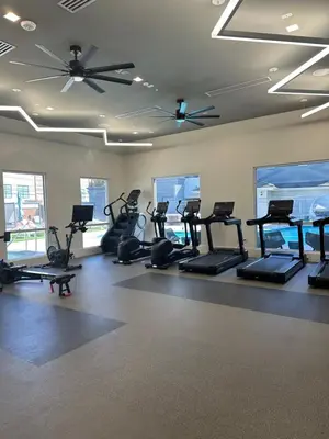 a gym with treadmills and ellipticals in a room at Loft Style,2 Beds ,Flexible self check in,Pool in Marina del Rey
