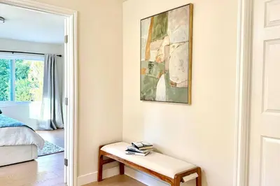 a room with a table and a picture on the wall at Jies choice Contemporary Elegance in Altadena in Altadena