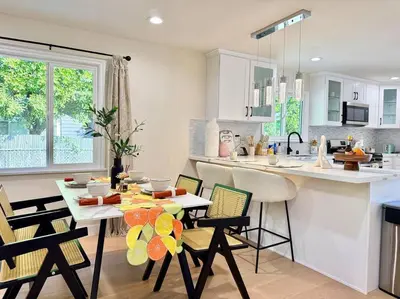 a kitchen and dining room with a table and chairs at Jies choice- Modern Luxe in Altadena in Altadena