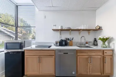a kitchen with a sink and a dishwasher at Walking distance to Caltech convention Center Pasadena Landmark room in Pasadena