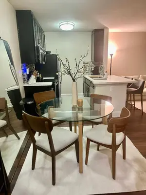 a dining room with a glass table and chairs at Cozy Gem Near Old Town Pasadena in Pasadena