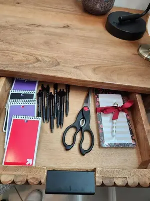 a wooden table with scissors and other items on it at Spacious 1 Bed ADU in Encino, Home Away from Home in Los Angeles