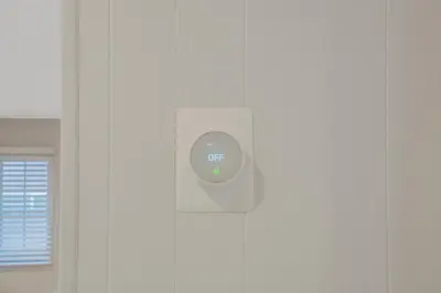 a thermostat on a wall in a room at Spacious House, Central, All Amenities in Harbor City