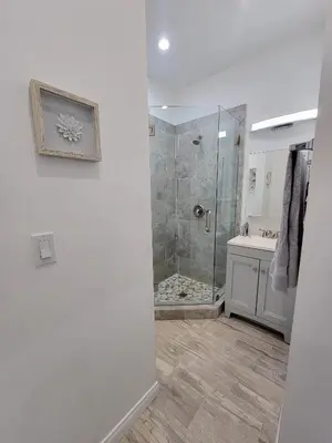 a bathroom with a shower and a sink at Modern Studio apartment right next to MrC hotel 5 minutes to Rodeo Drive in Los Angeles