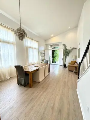 a living room with a table and a couch at Entire Fully Furnished Home in Camarillo California. 10 Mins from the beach in Camarillo