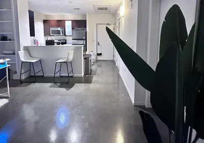 a kitchen with a table and chairs in a room at 1 br spacious in Hollywood in Los Angeles