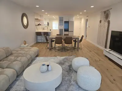 a living room with a couch and a table at NEW 2BD Majestic Gateway in Glendale in Glendale