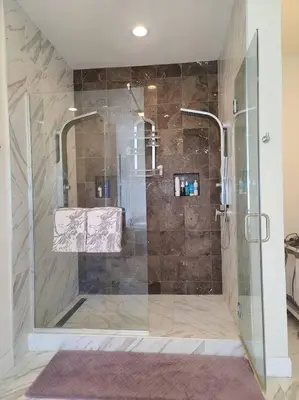 a shower with a glass door in a bathroom at Huge Family House Vacation Villa VIEW Pool King Bedroom in Walnut