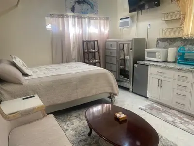 a hospital room with a bed and a table at Hidden Gem in Stevenson Ranch