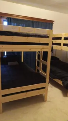 a couple of bunk beds in a room at Westminster Home in Westminster