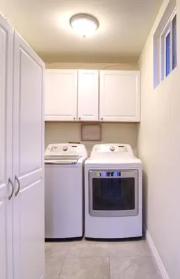 a laundry room with a washer and dryer at Modern LA Home - King Bed, Outdoor Living, Firepit in Los Angeles