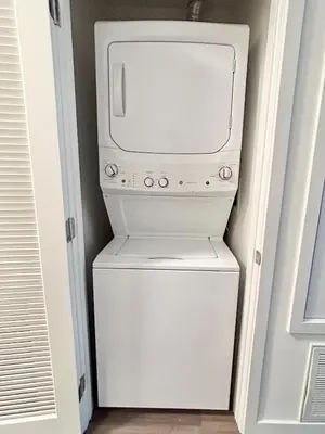 a white washer and dryer in a room at West Hollywood Gem 2-Bedroom Apartment in Los Angeles